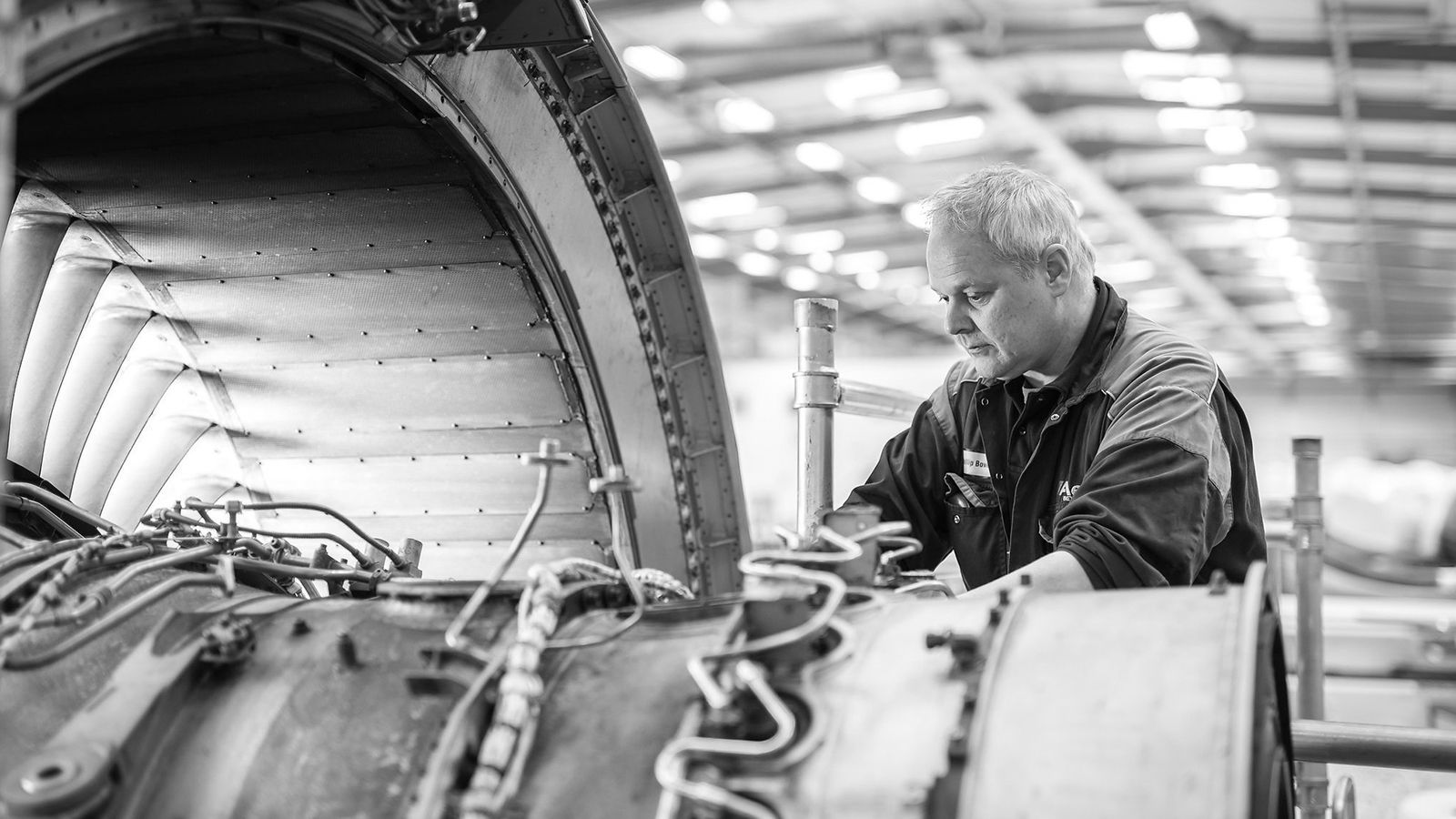 Aerfin employee working on an engine